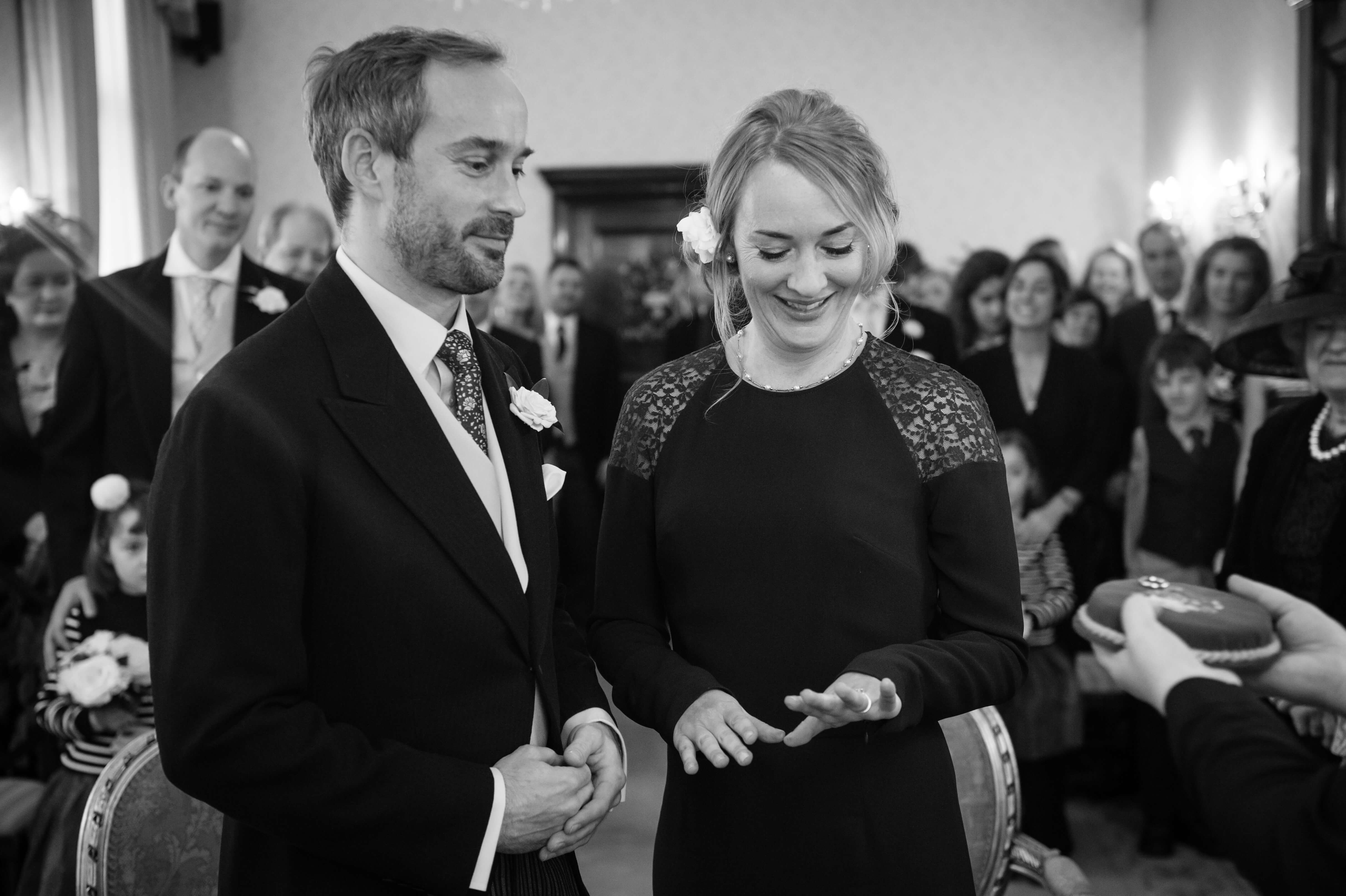 exchange of rings at chelsea old town hall wedding in london